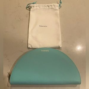 Tiffany & Co. Smooth leather half moon wallet.